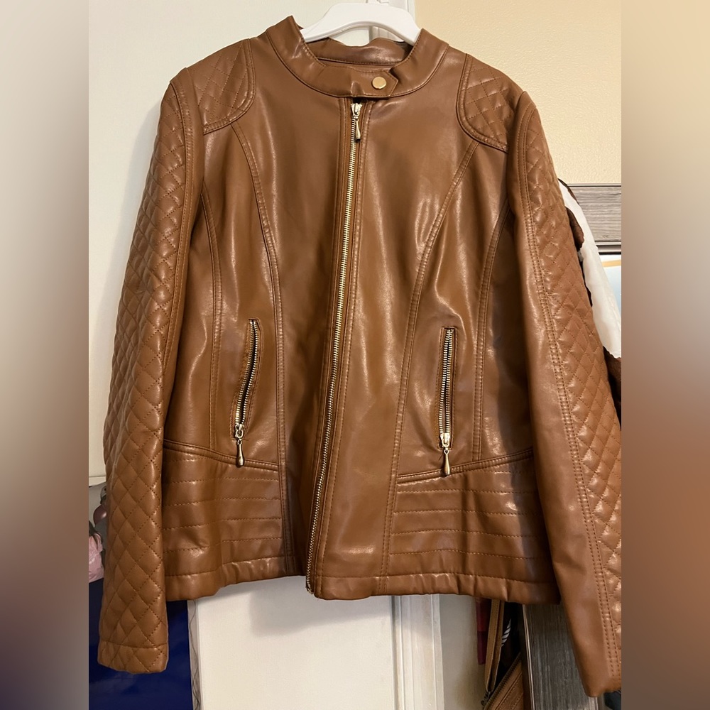 Brown leather jacket.